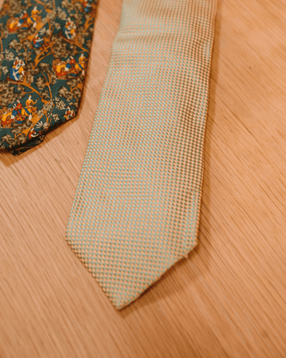 Set of Leonard, Salvatore Feragamo, and Burberry Ties