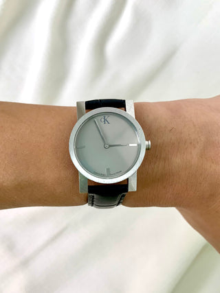 Calvin Klein Quartz Silver Round Black Leather Strap Watch