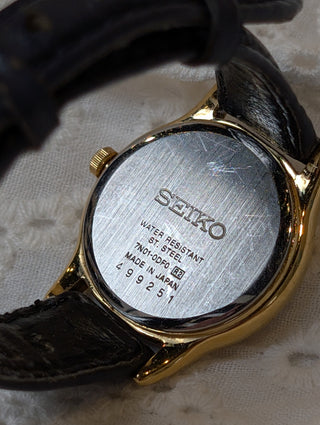Vintage Seiko Quartz Gold Round Navy Leather Strap Watch