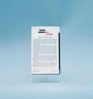 Between Capitalism and Socialism: Essays in political economics - Thryft